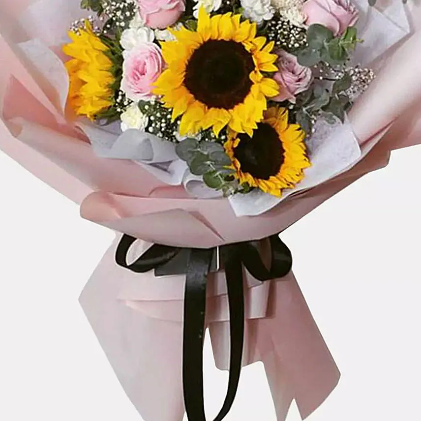 Bunch Of Sunrise Flowers With Chocolate Cake