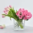 Elegant Pink Roses and Tulips Arrangement in a Glass Vase