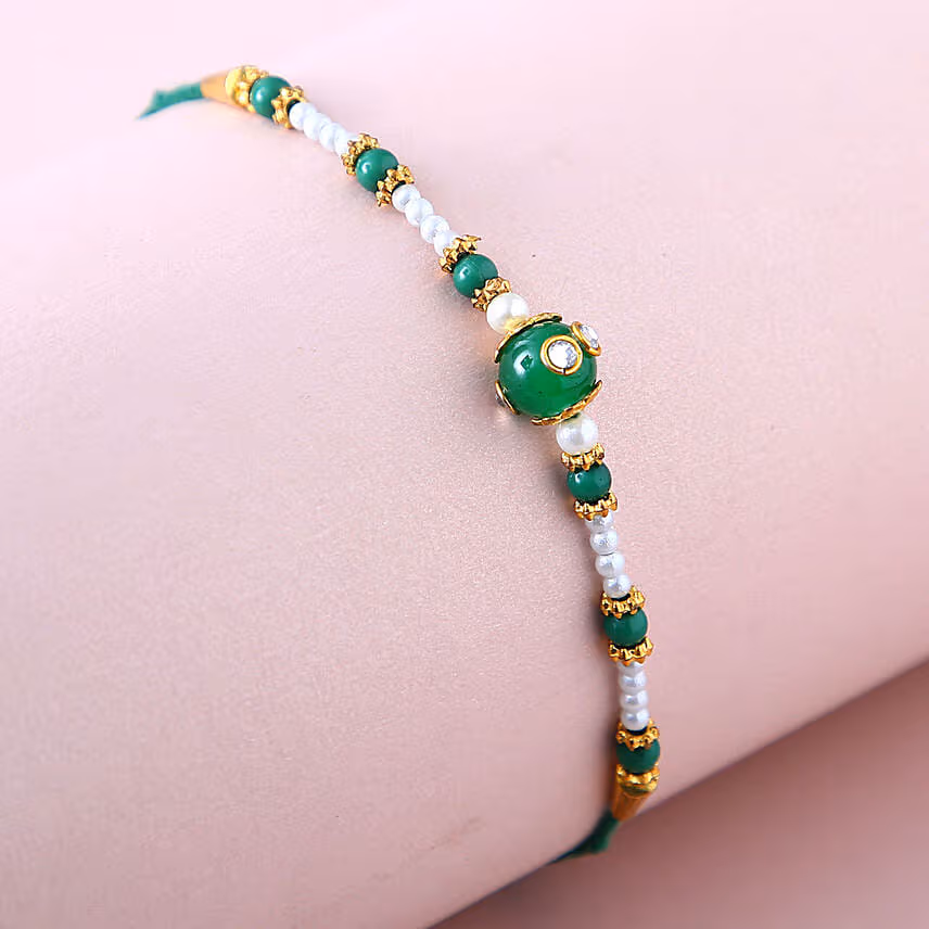 Sneh Green Rakhi With Lindt Chocolates & Almonds