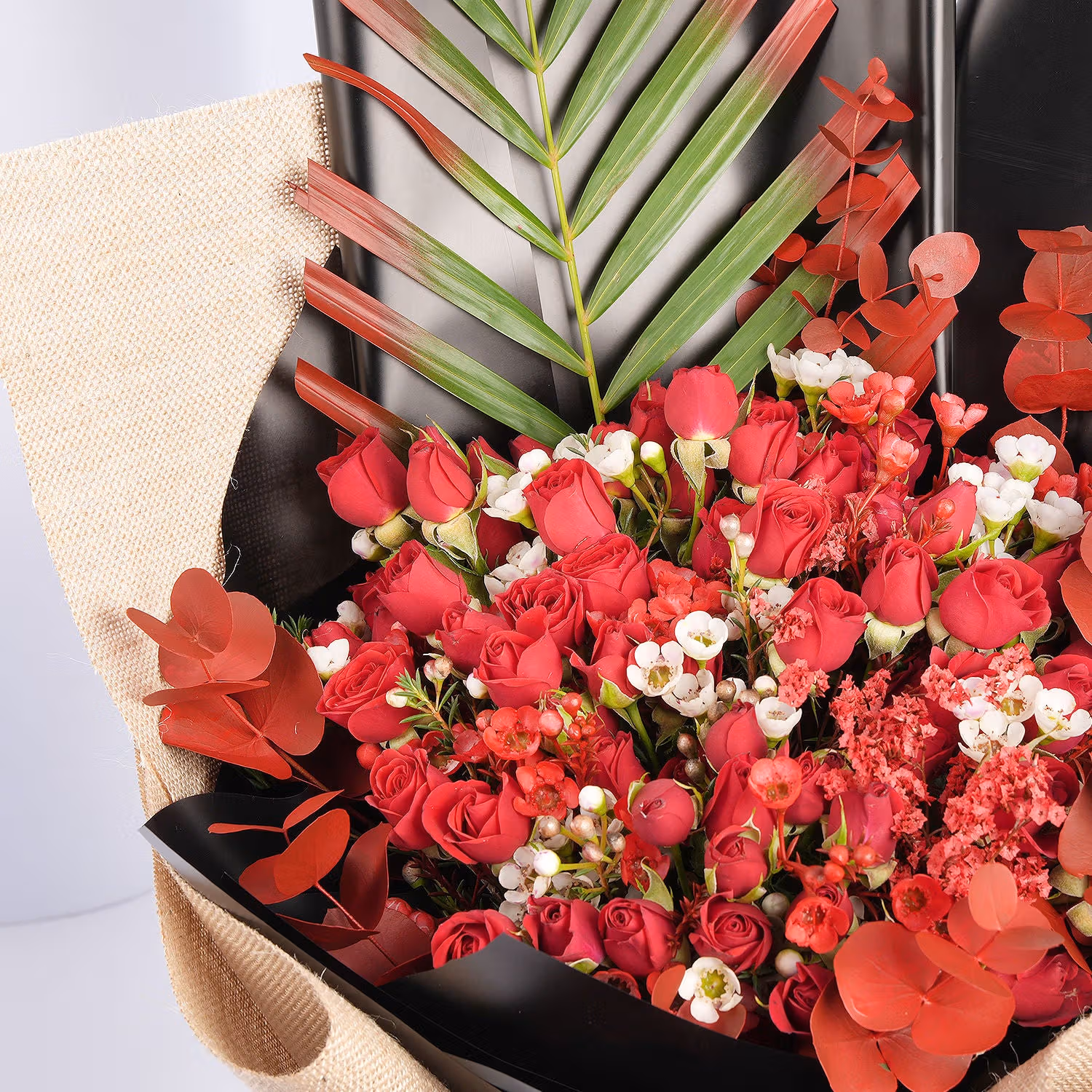 Crimson Charm & Rustic Romance: Luxurious Red Rose Bouquet