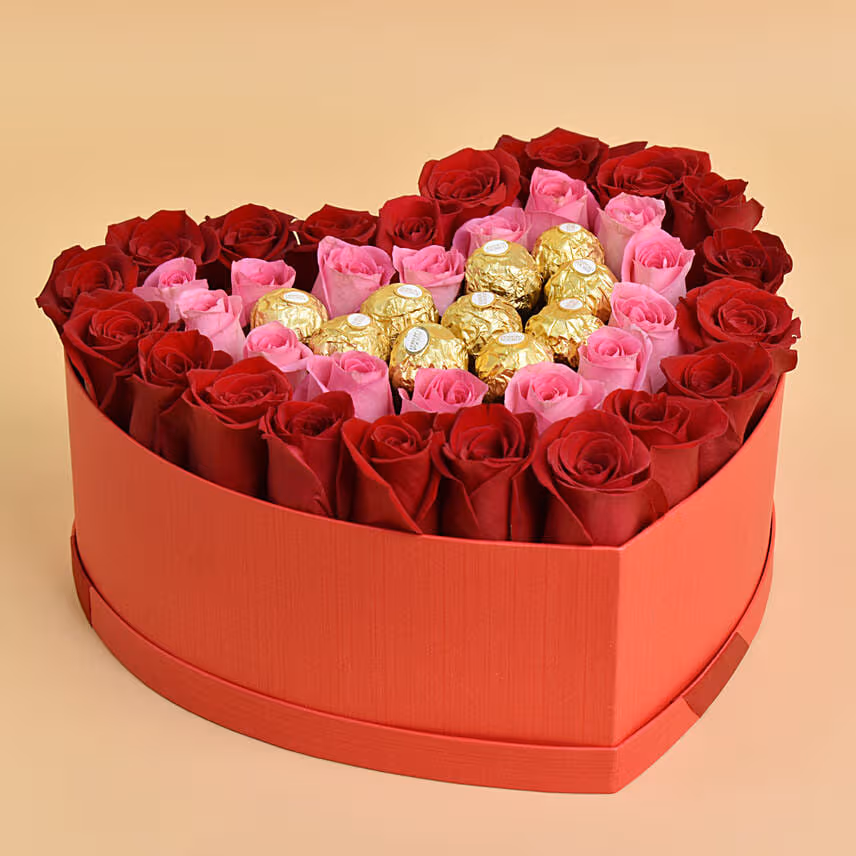 Roses and Chocolate In a Heart Shaped Box