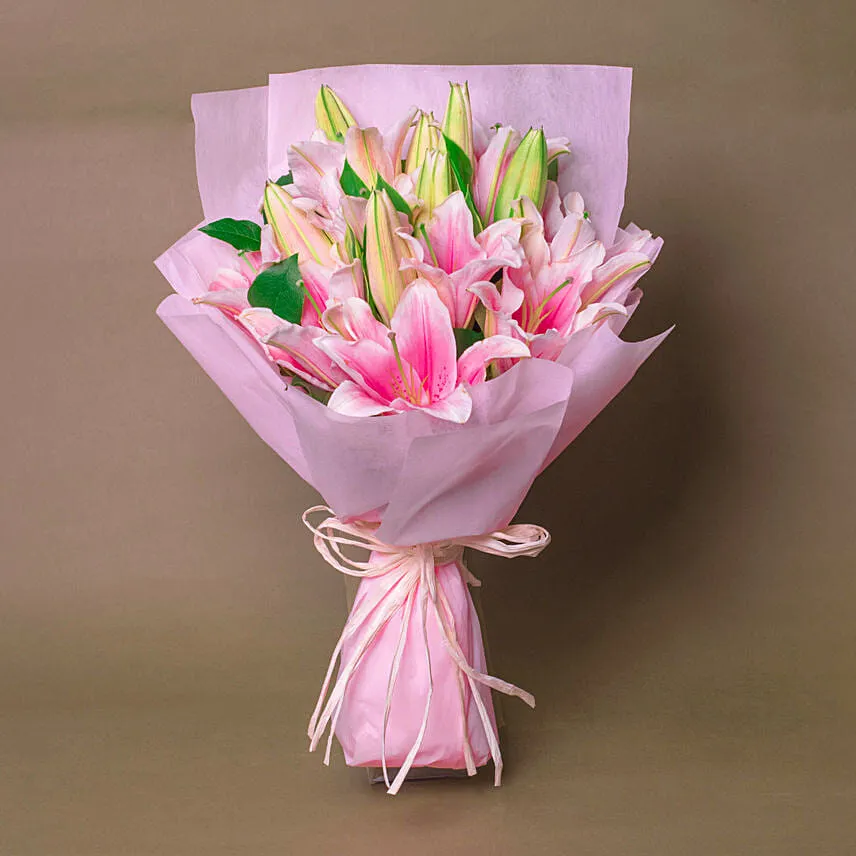 6 Passionate Oriental Pink Lilies with Red & White Pearl Rakhi