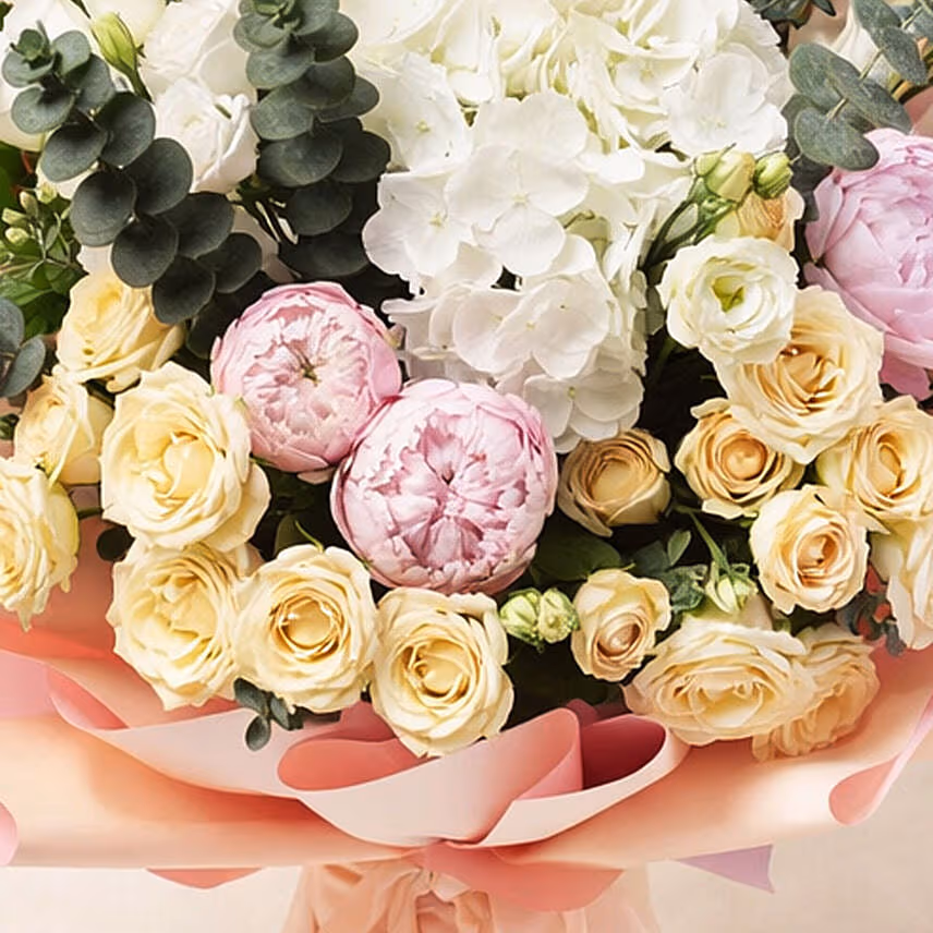 Ravishing Mixed Flowers Wrapped Bouquet