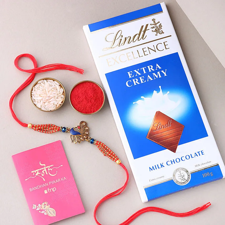 Sneh Blue Peacock Designer Rakhi with Lindt Extra Creamy Milk Chocolate