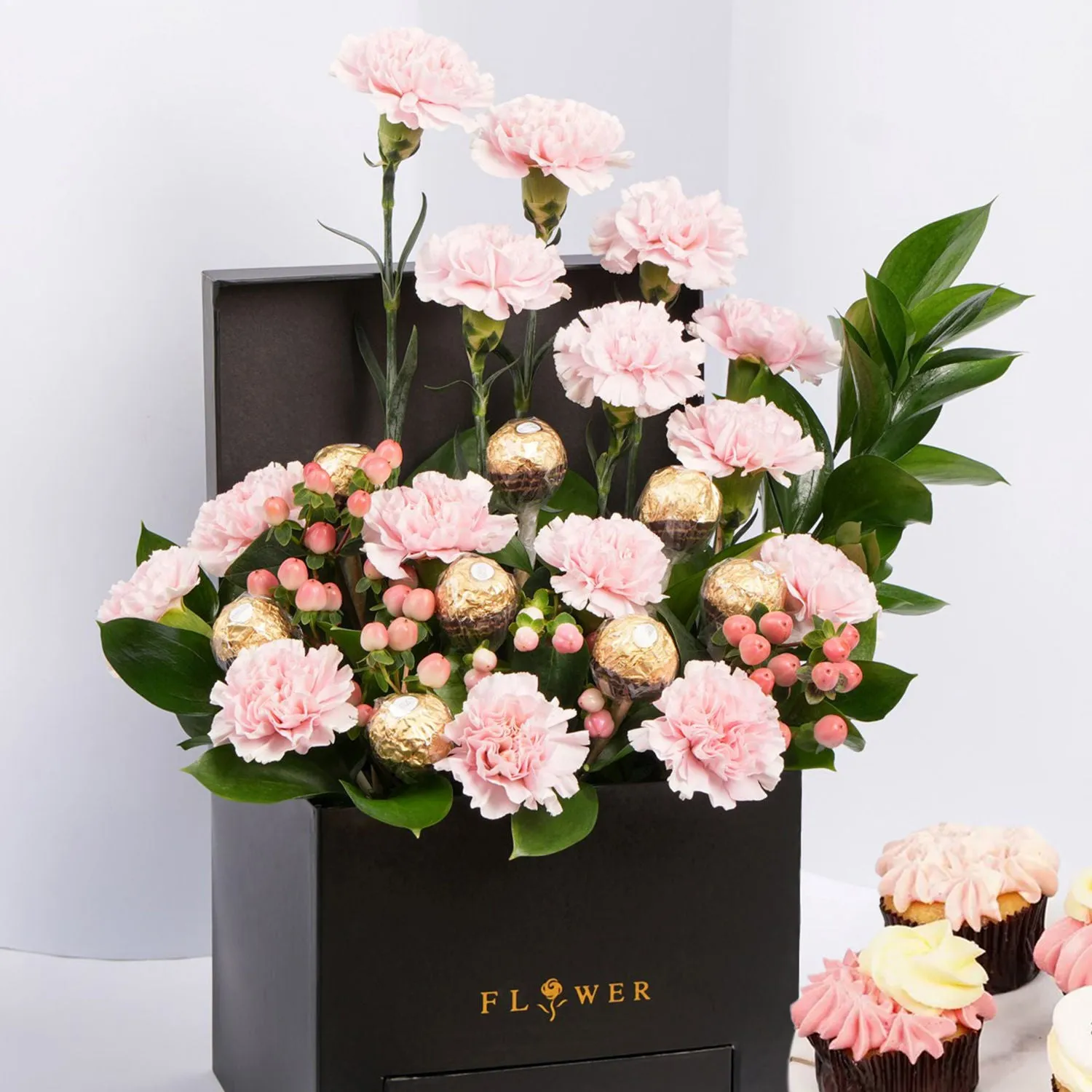 Elegant Heartfelt Arrangement with Pink Carnations and Cupcakes