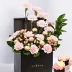 Elegant Heartfelt Arrangement with Pink Carnations and Cupcakes