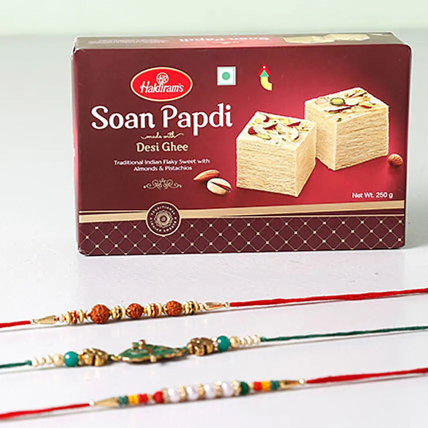 Pretty Rakhis With Soan Papdi Combo