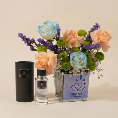 Blooming Passion: تنسيق زهري رائع مع عطر فاخر للجنسين - إيمانويل جين باريس VIP سيلفر EDP 90ML