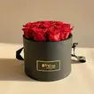 Luxurious 12 Red Roses in Elegant Black Round Box