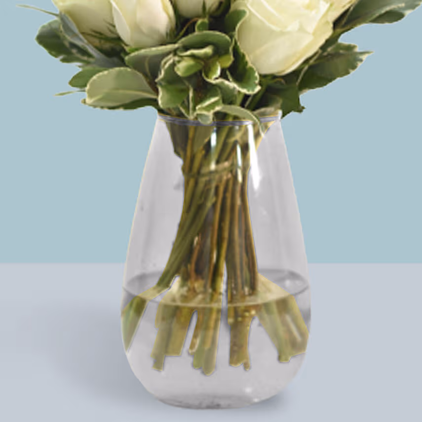 White Roses Arrangement In A Glass Vase