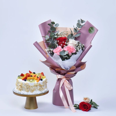 Elegant Flower Trio with Delightful Fresh Fruit Cake