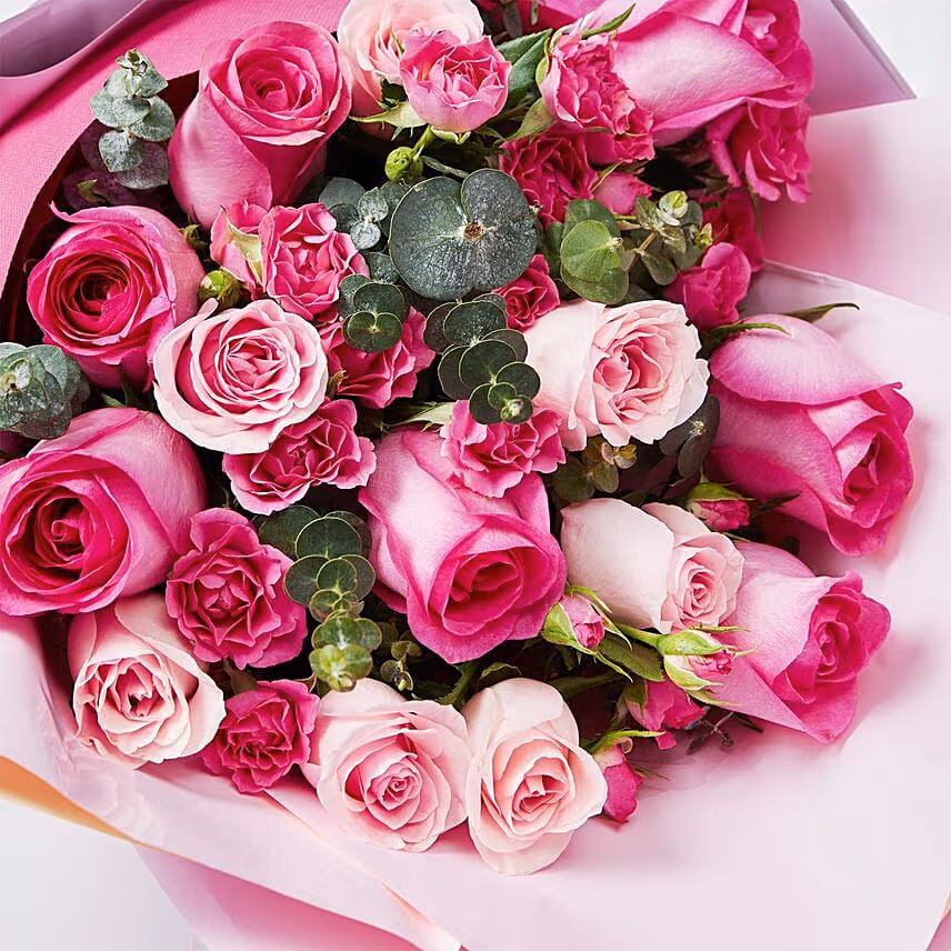 Magnificent Mixed Roses Wrapped Bouquet With Cake