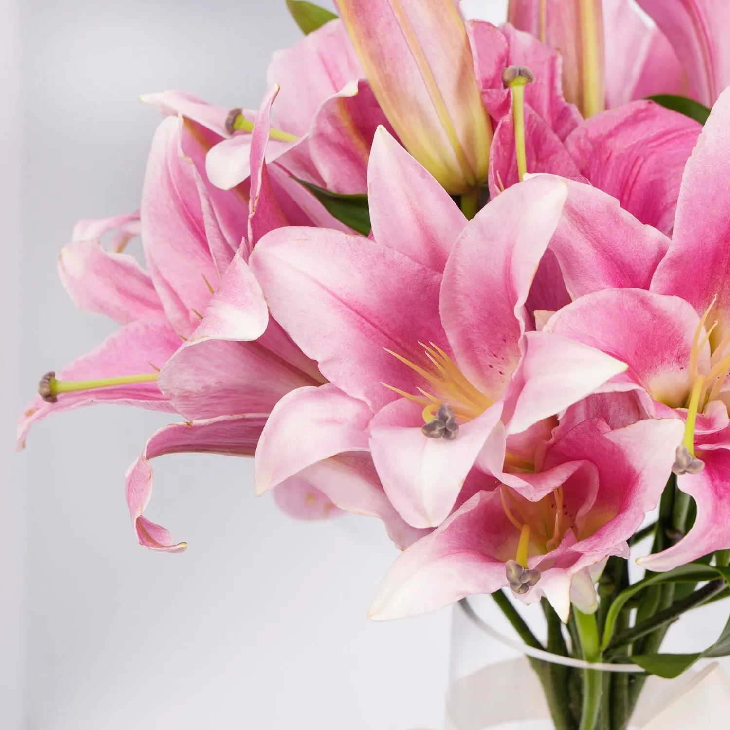 Elegant Blushing Pink Lilies Arrangement with Decorative Topper
