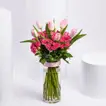 Charming Bouquet of Pink Tulips & Baby Roses in Elegant Glass Vase