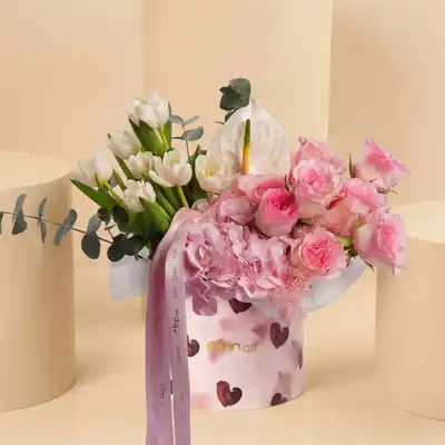 A Mother's Sweet Embrace: Elegant Floral Arrangement
