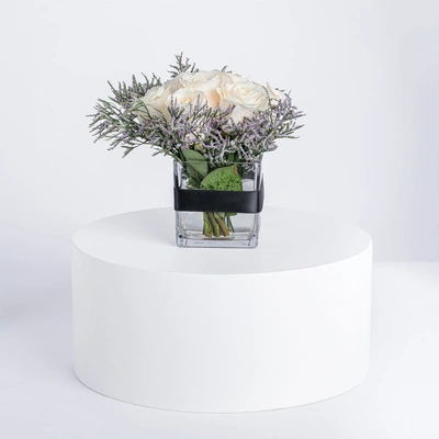 Elegant Arrangement: 9 White Roses in a Glass Vase