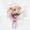 Elegant Floral Tribute: Pink Roses and Carnations Bouquet