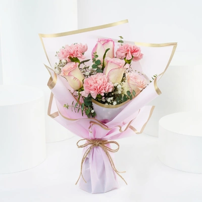 Elegant Floral Tribute: Pink Roses and Carnations Bouquet