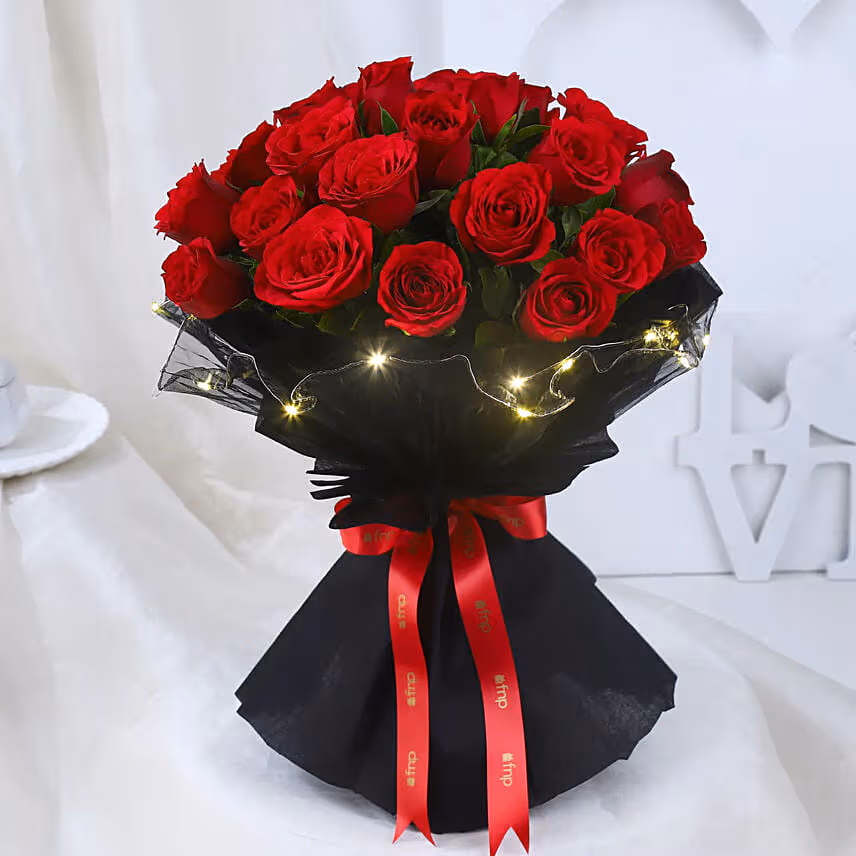 LED Elegance Rose Embrace Bouquet With Designer Peacock Rakhi