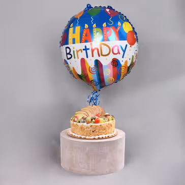 Delightful Birthday Surprise Gift - 1 Kg Fruit Cake & Foil Balloon