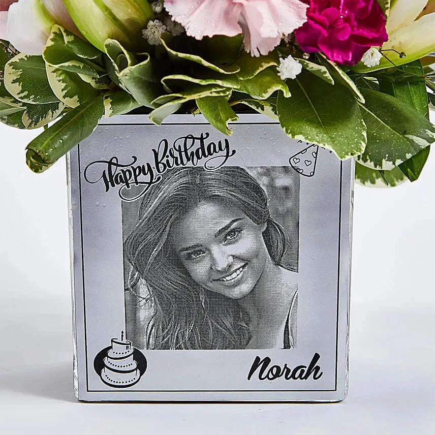 Personalised vase with flower arrangement