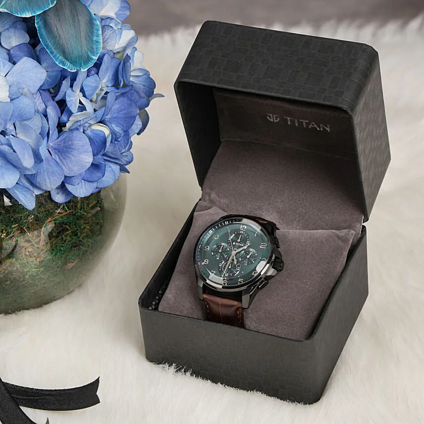 Titan Blue Dial Strap watch for men with exquisite floweral arrangment