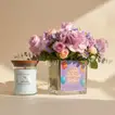 Blooming Bliss: Elegant Floral Arrangement with Magnolia Birch Candle