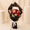 Red Roses And Alstroemeria In Black Wrapping For Graduation