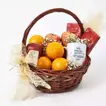 Exquisite Birthday Basket: Fruits and Lindt Chocolate Surprise