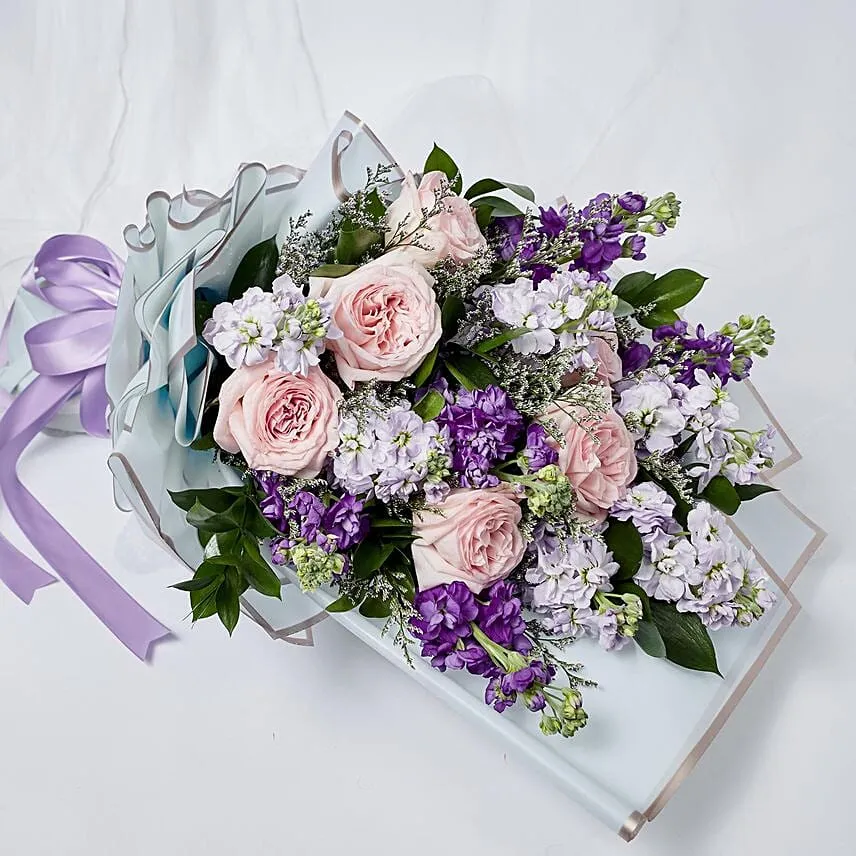 Elegant Mixed Flowers Wrapped Bouquet With Chocolate