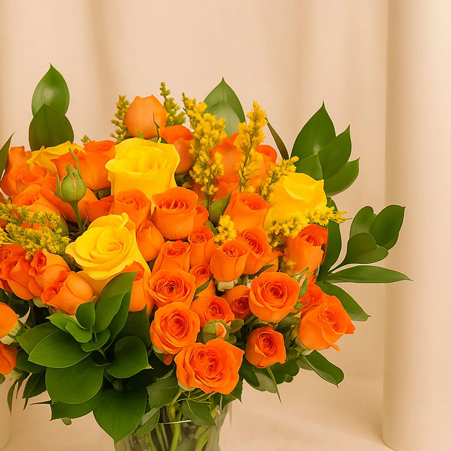 Orange And Yellow Rose Arrangement In A Vase For Graduation