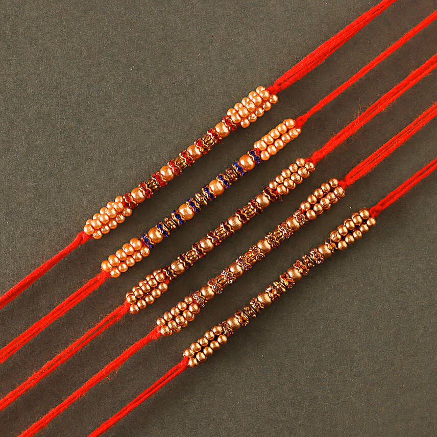 Sneh Colourful Pearl Rakhi Set & Rasgullas