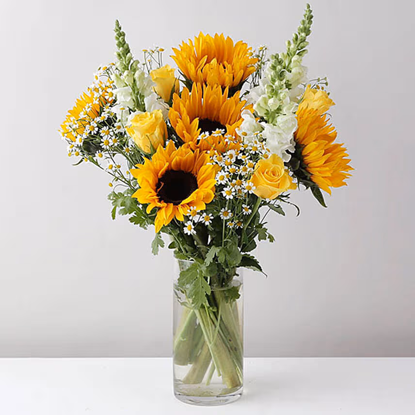 Alluring Mixed Flowers Glass Vase With Chocolate