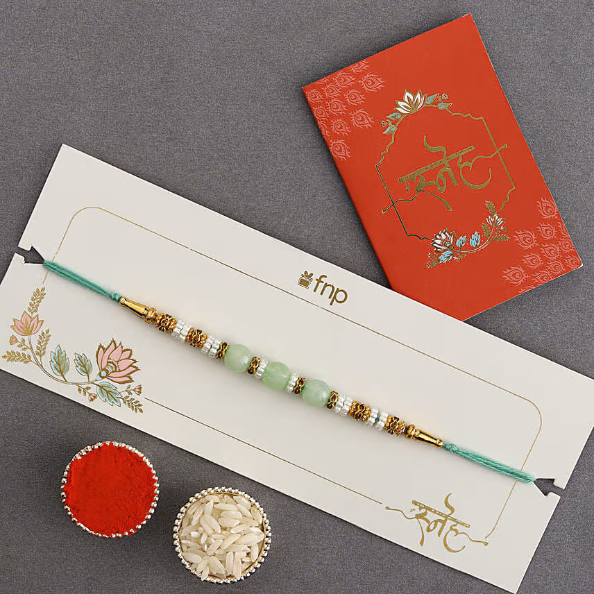 Graceful Single Pearl Ethnic Rakhi Green
