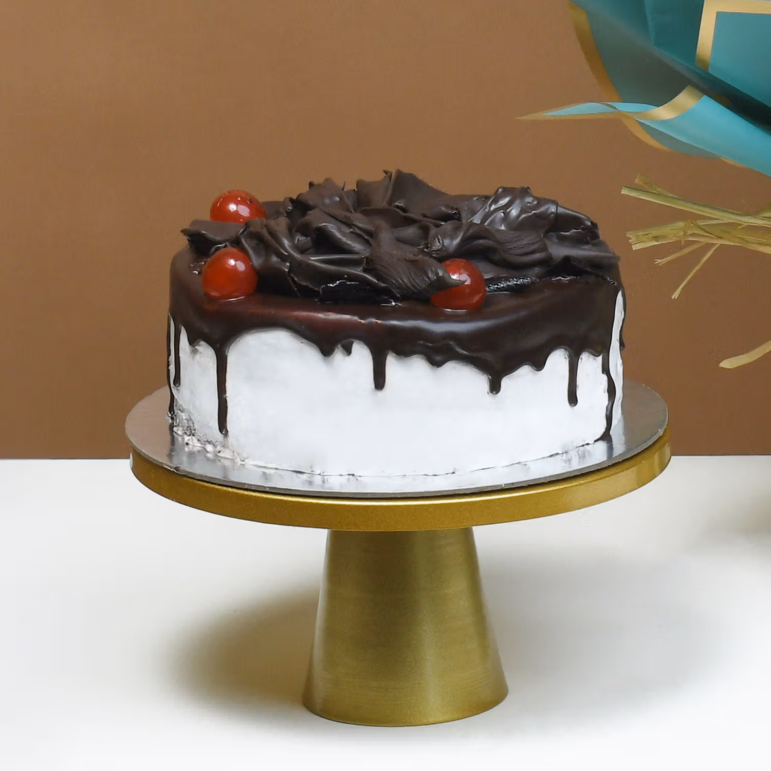 Harvest Glow: Orange Roses with Black Forest Cake Delight