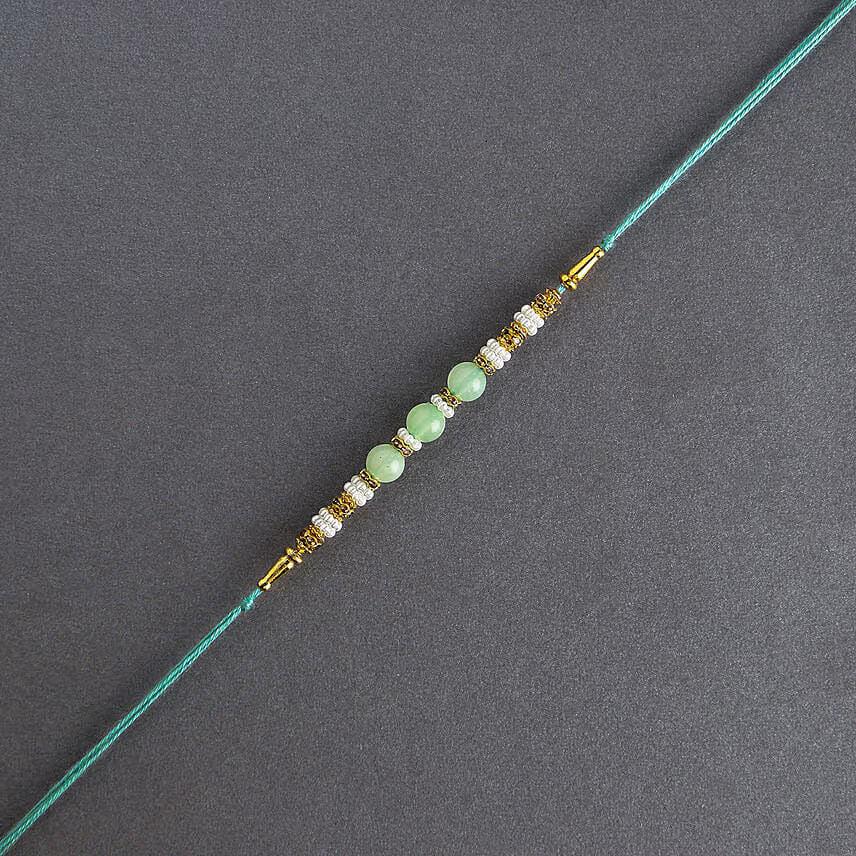 Graceful Single Pearl Ethnic Rakhi Green