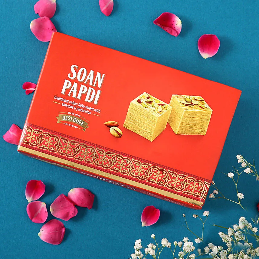 Rose Gold Pearl And Beads Rakhi with 250 Grams Soan Papdi and Almonds