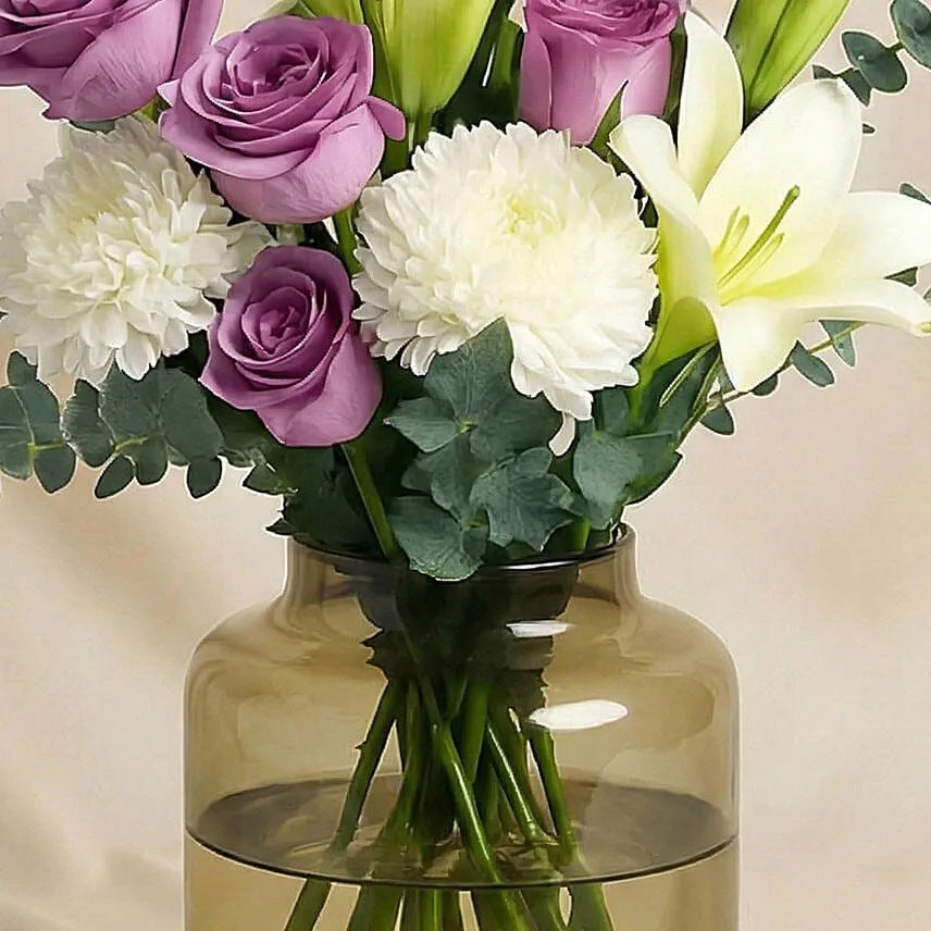 Lovely Mixed Flowers Oval Shaped Vase