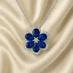Elegant Blue Bloom Silver Necklace with Romantic Red Flower Arrangement