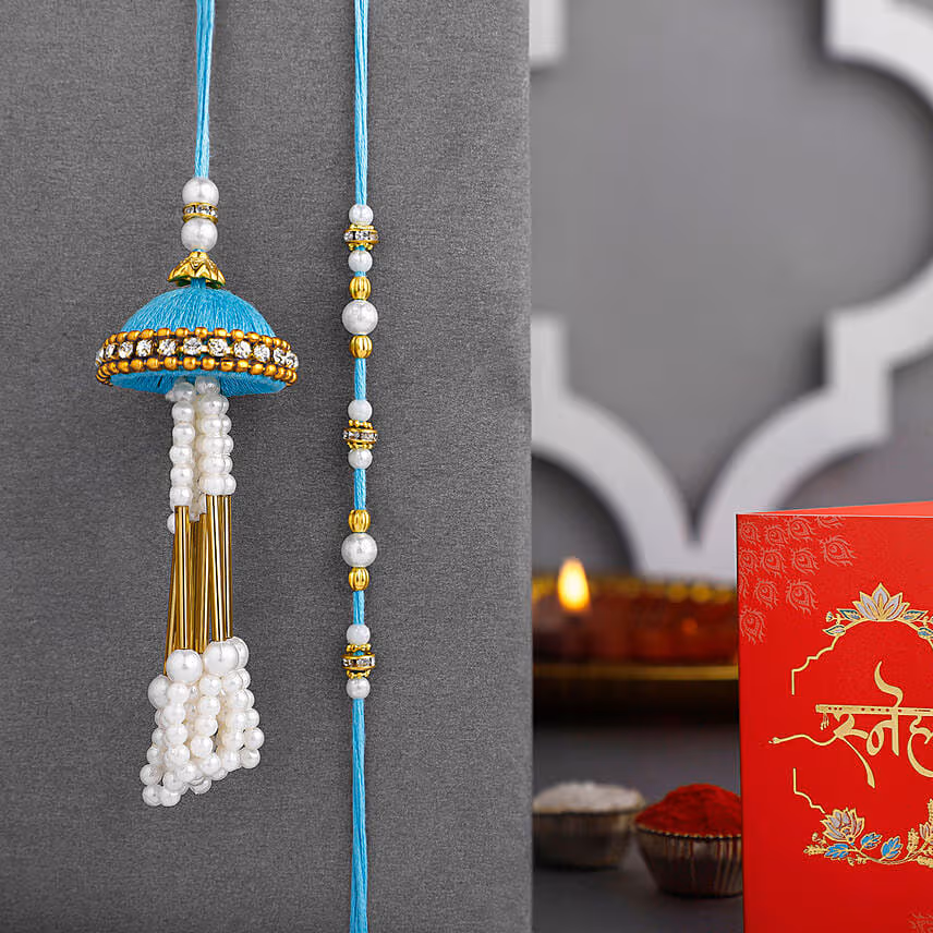 Teal Jhumar Lumba Pearl Rakhi Set N Besan Laddoo Surprise