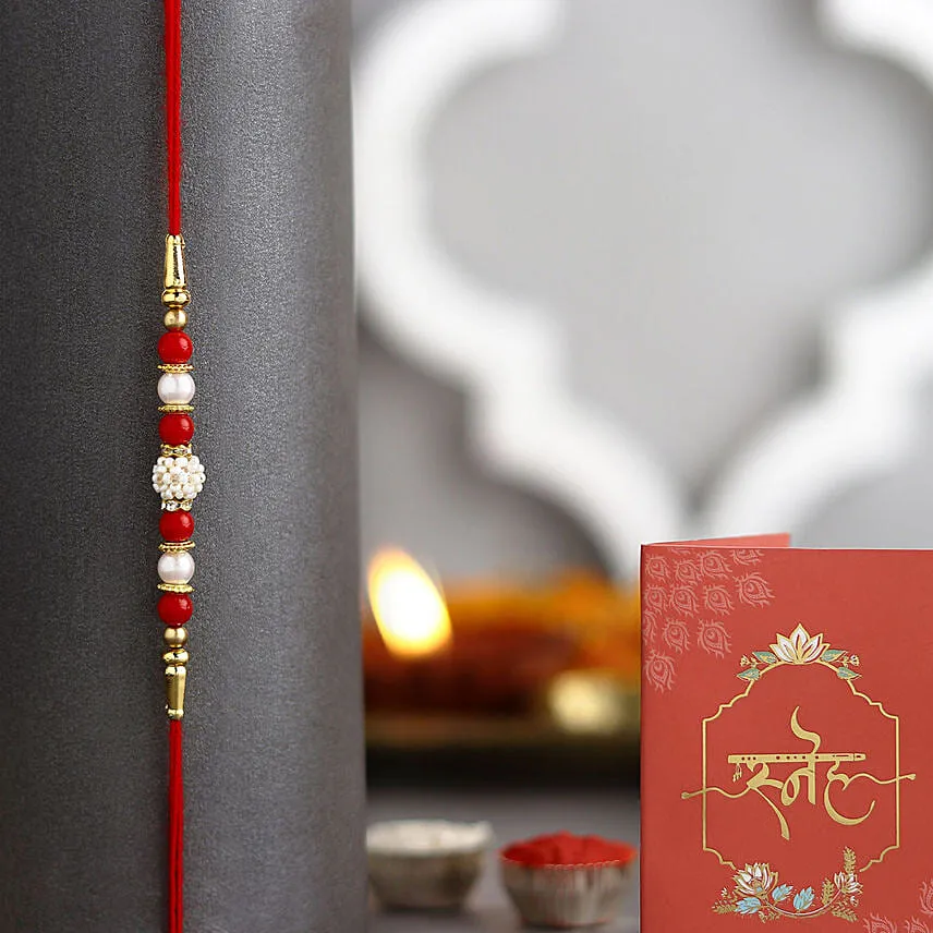 6 Passionate Oriental Pink Lilies with Red & White Pearl Rakhi