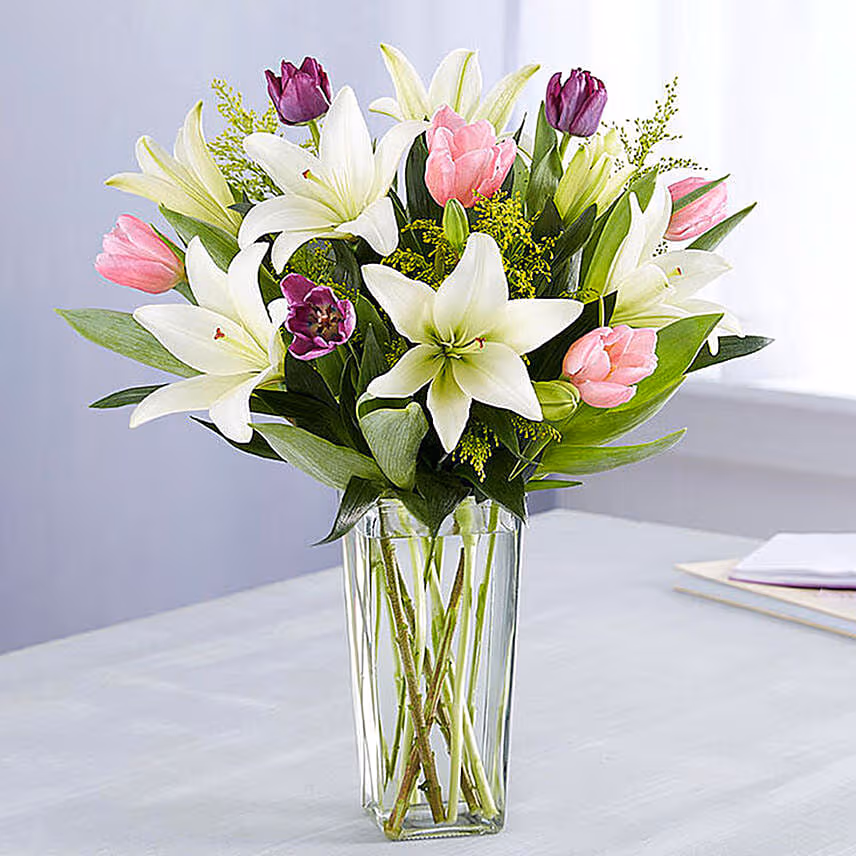 Medley Of Lilies And Tulips With Birthday Balloons