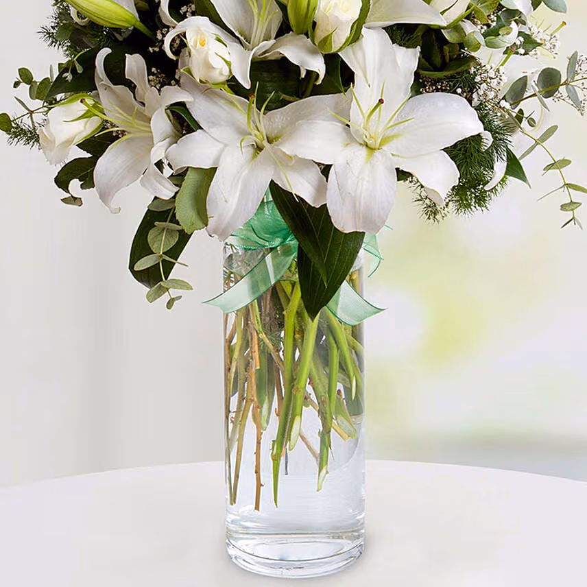 Charm Of White With Lilies And Roses With Chocolate Cake