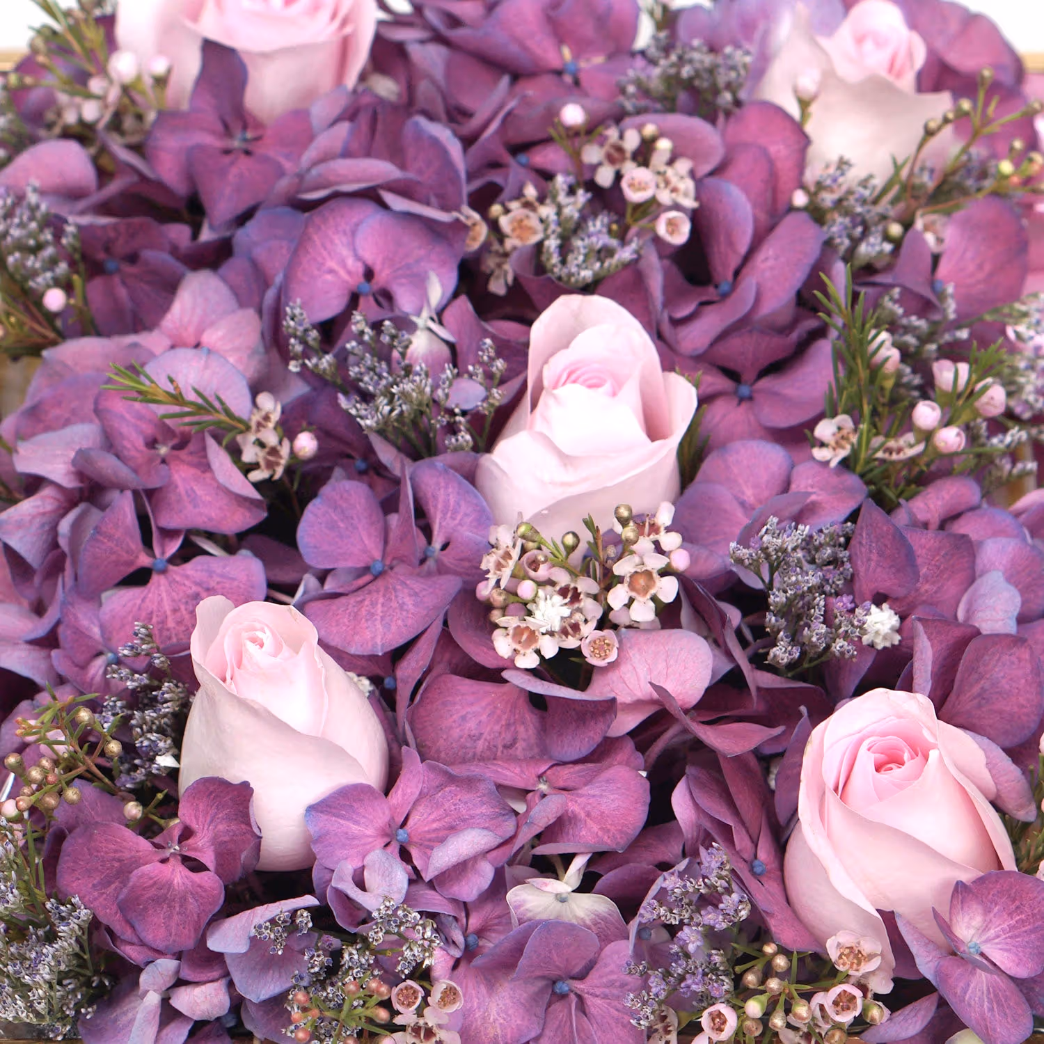 Elegant Mixed Flowers and Chocolates on a Luxurious Golden Tray
