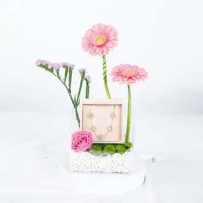Blush Bloom Treasure: Elegant Floral Arrangement with Sterling Silver Bracelet