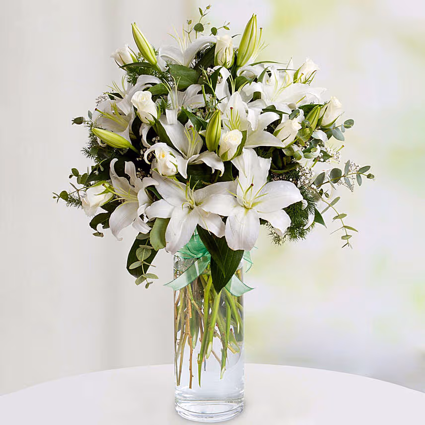 Charm Of White With Lilies And Roses With Chocolate Cake