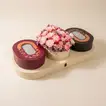 Elegant Crescent Bloom with Gourmet Chocolate Selection