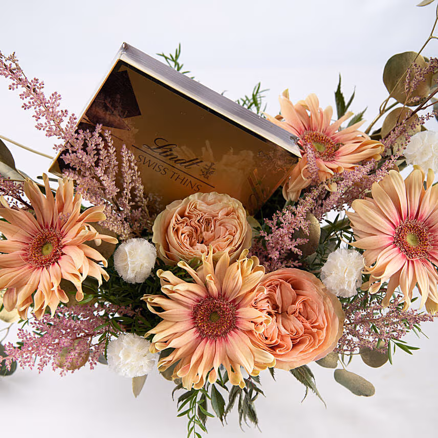 Ravishing Flowers Arrangement and Chocolate