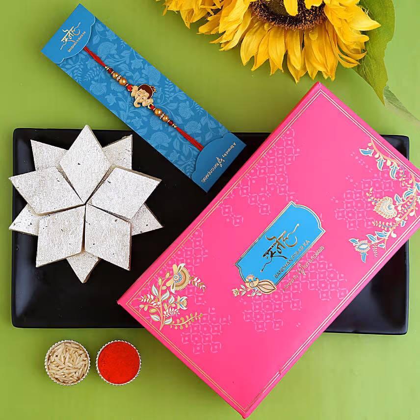 Long Trunk Bal Ganesha Kids Rakhi And Kaju Katli