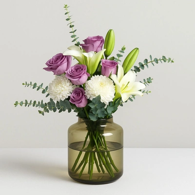 Lovely Mixed Flowers Oval Shaped Vase